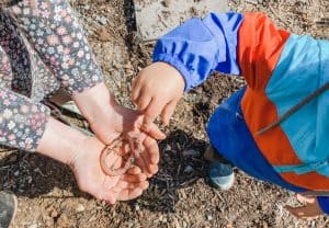 Kids Holding Worm